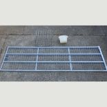 A large metal field gate, clad with galvanized mesh, 370cm,