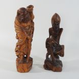 A wooden figural carving of a Chinese man, 30cm high,