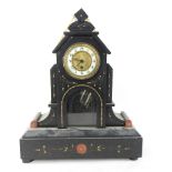 A black slate clock garniture,
