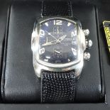 A Newton and Sons Bombay Bubble wristwatch, on a black leather strap,