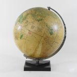 A 1940's globe, on a bakelite stand,