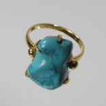 An 18 carat gold lapis lazuli ring,