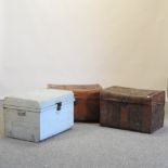 A vintage metal trunk, together with two others,
