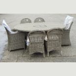 A beige rattan oval table with integral ice bucket, 180 x 120cm, together with four chairs,