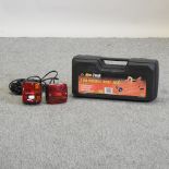 A magnetic trailer light set, together with a trolley jack,
