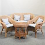 A wicker conservatory suite, comprising a sofa, 130cm,