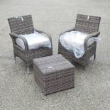 A beige rattan armchair, together with another, with cushions, and a coffee table,