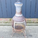 A metal garden chiminea,