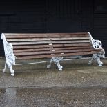 A royal park bench, with cast iron ends and hardwood slats,