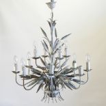 An ornate cream painted metal chandelier,