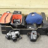 A box of cameras and various lenses