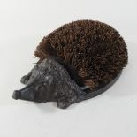 A boot brush, in the form of a hedgehog,