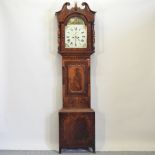 A George III mahogany cased longcase clock, with a painted dial and eight day movement,