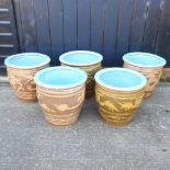 A set of five glazed garden pots,