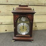 A reproduction mahogany bracket clock,