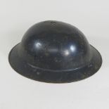 A World War II Tommy helmet