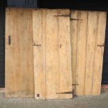 An antique pine interior door, together with two others,