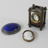 A miniature carriage clock, 6cm high,