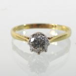 An 18 carat gold diamond solitaire ring, approximately 0.