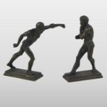 A pair of small bronze figures of male athletes, after the antique, each in an animated pose,