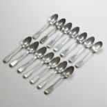 A set of eight Victorian silver fiddle pattern teaspoons, London 1857,