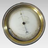 A 19th century Casella brass cased aneroid barometer and thermometer,