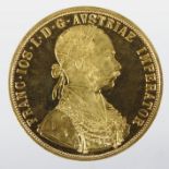 An Austrian gold four Ducat, 1915, obverse with Emperor Franz Joseph I laureate head,