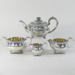 A Victorian four piece silver tea service, each of circular faceted shape,