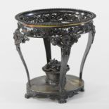 A George III silver stand, of oval shape, decorated with grape vines,