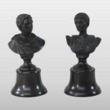 A pair of bronzed cast iron portrait busts, of Roman soldiers, each on a socle base,