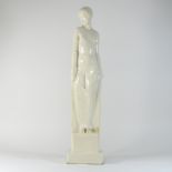 After Pierre La Faguays, an Art Deco style pottery figure of a lady,