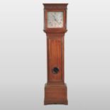 An 18th century oak cased longcase clock, the case enclosed by a door centred by a lenticle,