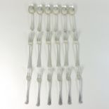 An Edwardian silver part table service, comprising six table forks, 20cm,