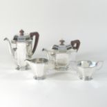 A matched silver four piece tea service, of octagonal form, comprising a teapot, coffee pot,