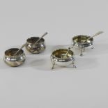 A pair of silver salts, 5cm diameter, together with a smaller pair,