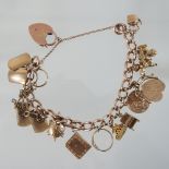 A 9 carat gold charm bracelet,