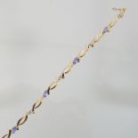 A 14 carat gold diamond and tanzanite bracelet,