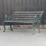 A slatted garden bench with metal ends,