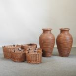 A pair of large brown glazed pottery vases, 72cm high,