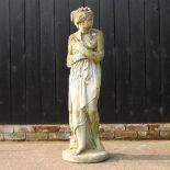 A large reconstituted stone figure of a lady,