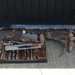 A collection of saws and planes,