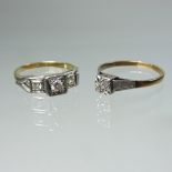 An unmarked diamond three stone ring, together with an 18 carat gold ring,