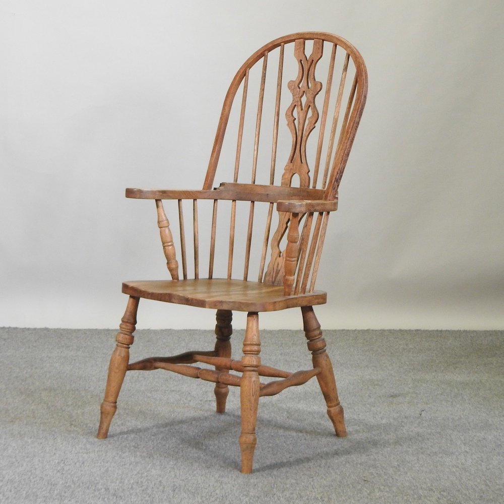 A 19th century style oak Windsor armchair