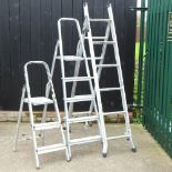 An aluminium step ladder, together with two others,