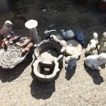 A collection of reconstituted stone garden animals