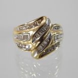 An 18 carat gold and diamond ring, of twisted design,