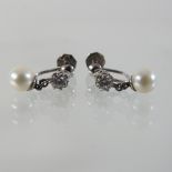 A pair of 9 carat white gold pearl and diamond earrings,