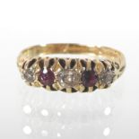 An 18 carat gold ruby and diamond five stone ring,