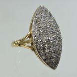 A platinum set diamond cluster ring, of elliptical shape,