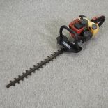 A petrol hedge trimmer